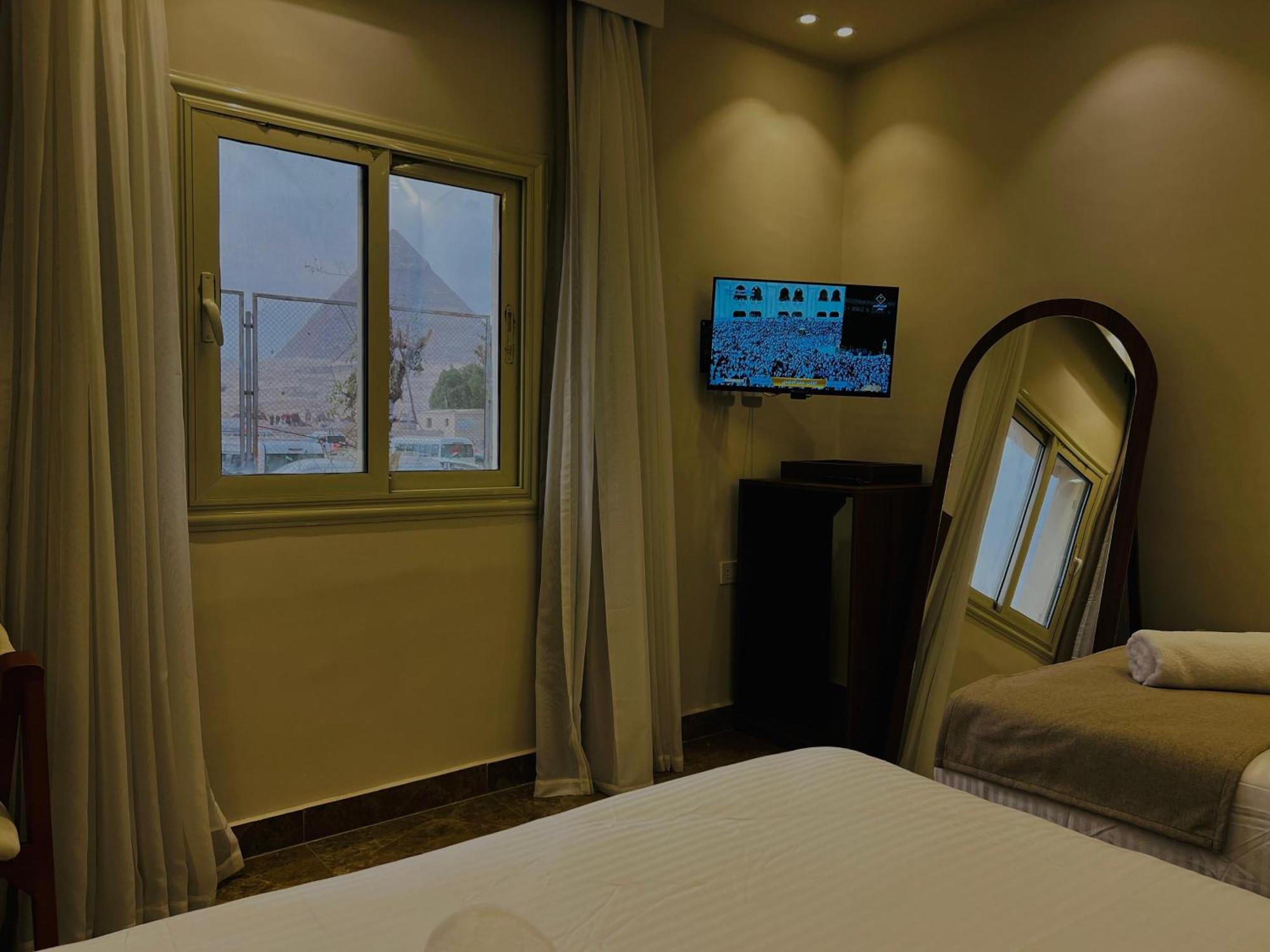 Great Scarab Pyramids View Hotel Kafret el-Gabal Exterior foto